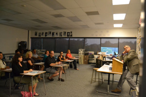 Teacher, Mr. Corcoran introduces himself to open house parents.