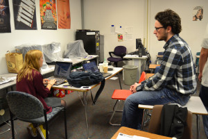 Anna Ringuette and Aloysious Brenner prep for a debate. 