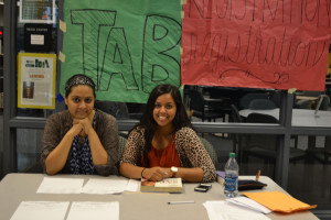 Saheli Ghosh and Anushka Sarkar working at teh TAB and Regsistration table 