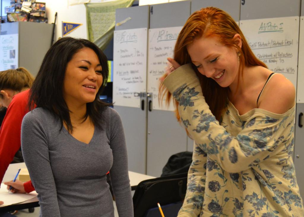 Daphne Cantuba and Kaylin Mahoney working in AP Studio Art together 