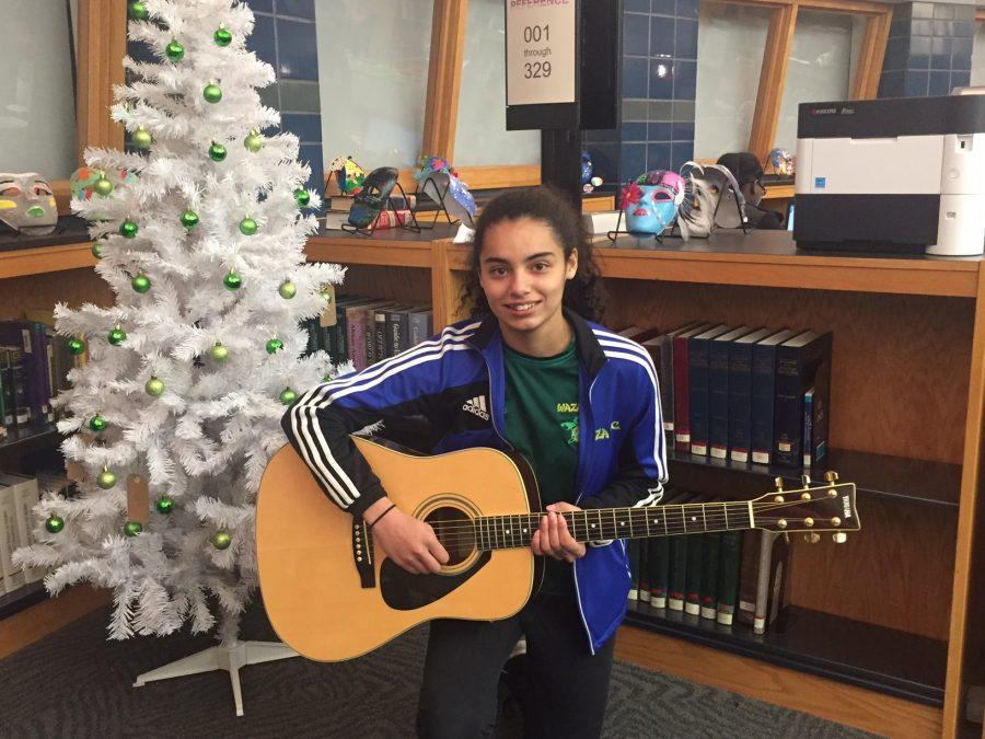 Freshman Gabby Green and her guitar at Coffee House 2016 