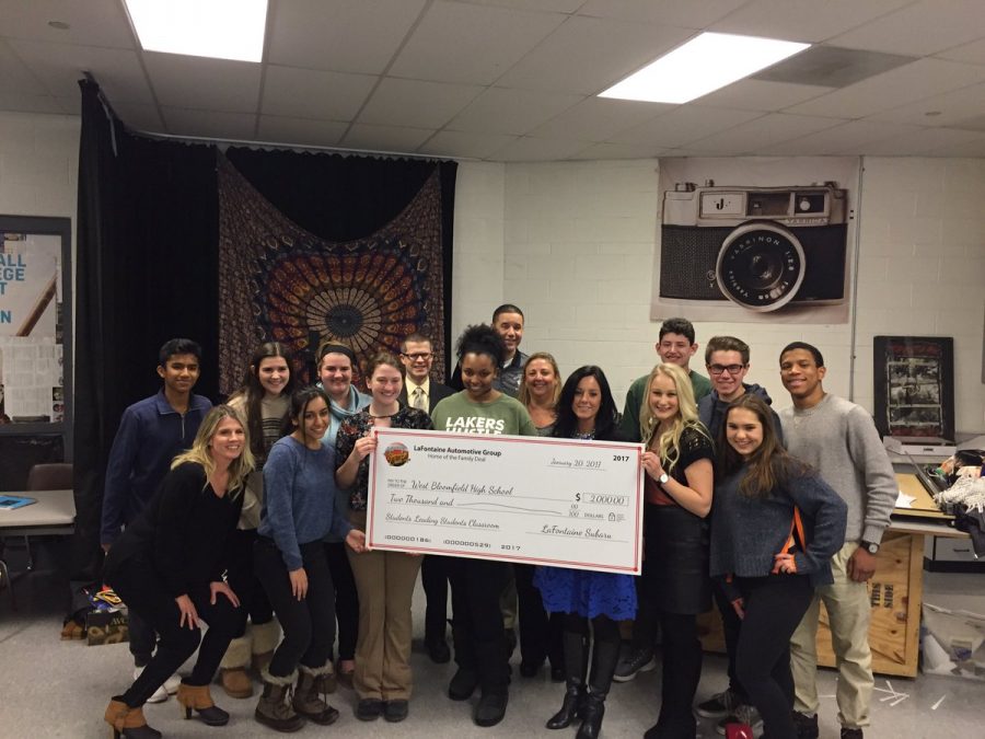 The LaFontain family surprised the club with a large check. 