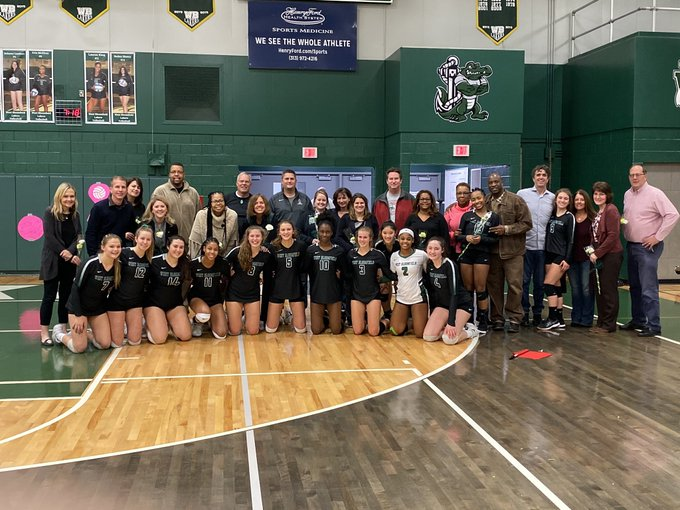 The volleyball team and their parents. Photo courtesy of West Bloomfield Athletics