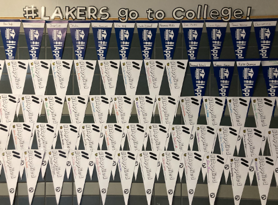 Flags in the iCenter hallway for each student who has applied to college