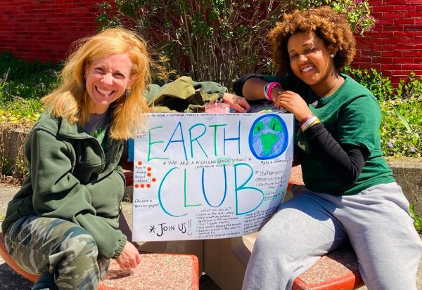 The Earth Club makes a poster to show off the best of what they do