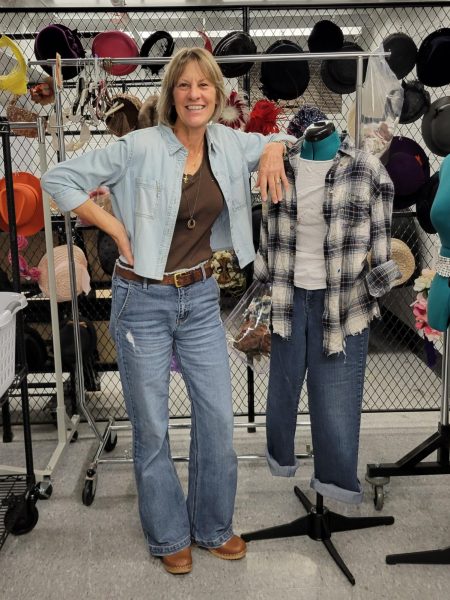 Mrs. Forhan stands next to a mannequin dressed up with a potential idea for the look of Ponyboy in upcoming production, The Outsiders